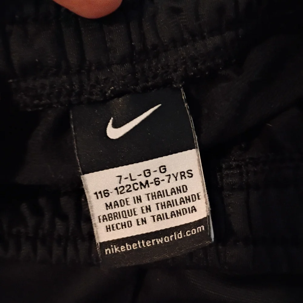 Nike Boys Black Track Pants With White And Red Size 7